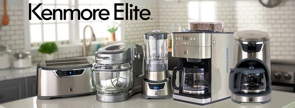 Collection of stainless steel Kenmore Elite small kitchen appliances on a gray marble kitchen island
