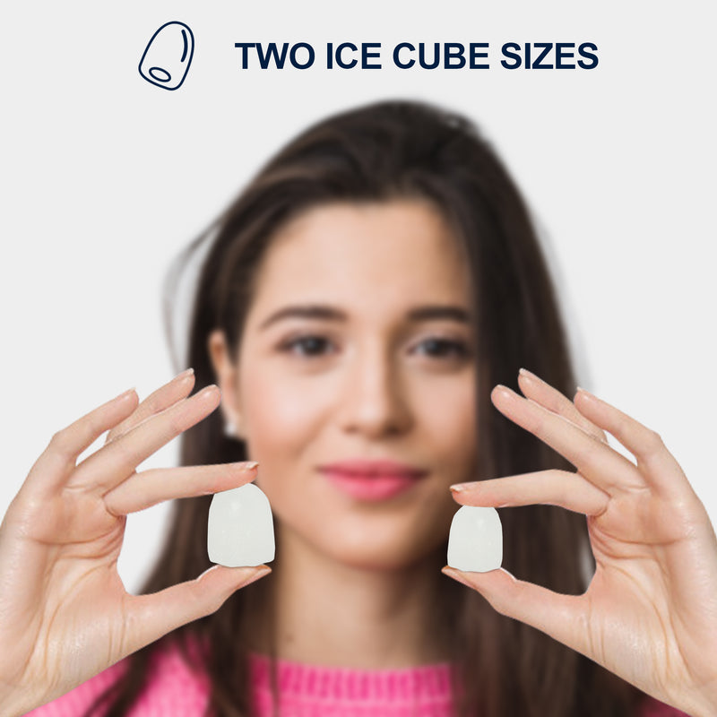 Lifestyle image of the head and shoulders of a person with light skin and long dark brown hair holding two bullet-shaped ice cubes, one large and one small, in front of her face. Text above reads, "Two ice cube sizes"