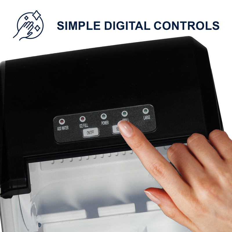 Closeup of top of ice maker showing the digital controls and LED indicators with a person's finger touching the cube size selector button. Text above reads, "Simple digital controls"
